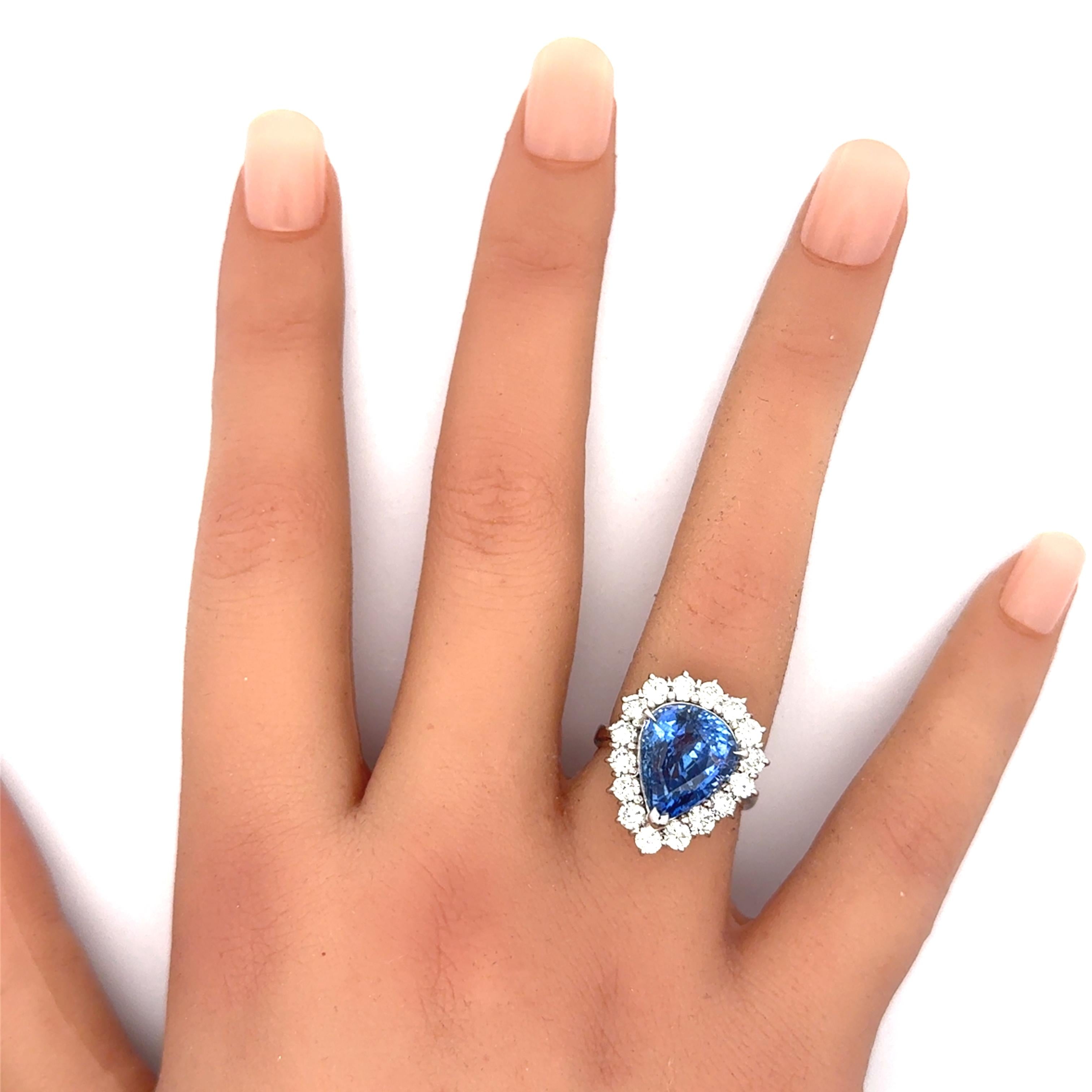 7.67 Carat Blue Sapphire Diamond Halo 18K White Gold Ring