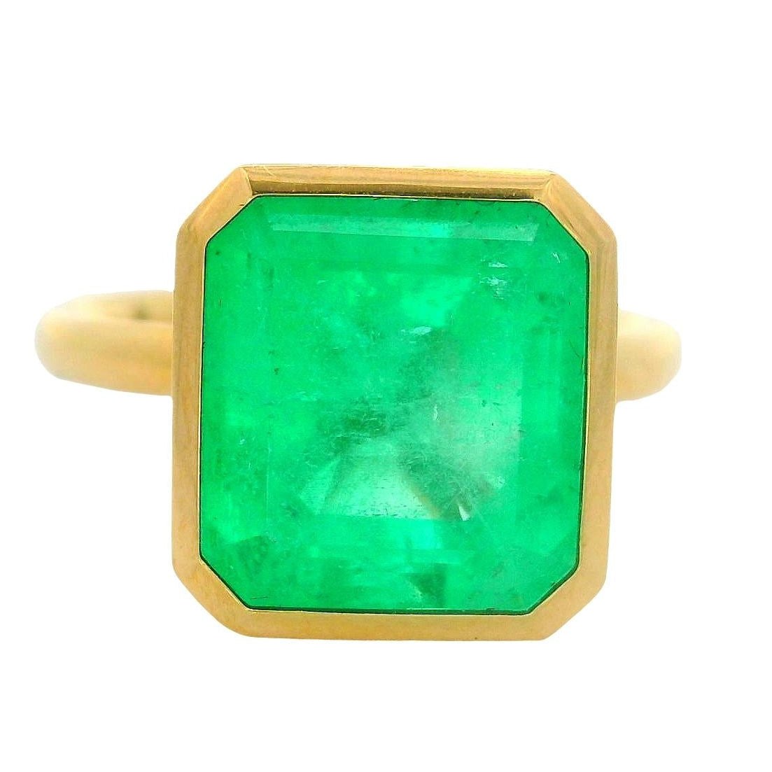 7.03 Carat Emerald 18K Yellow Gold Solitaire Bezel Ring