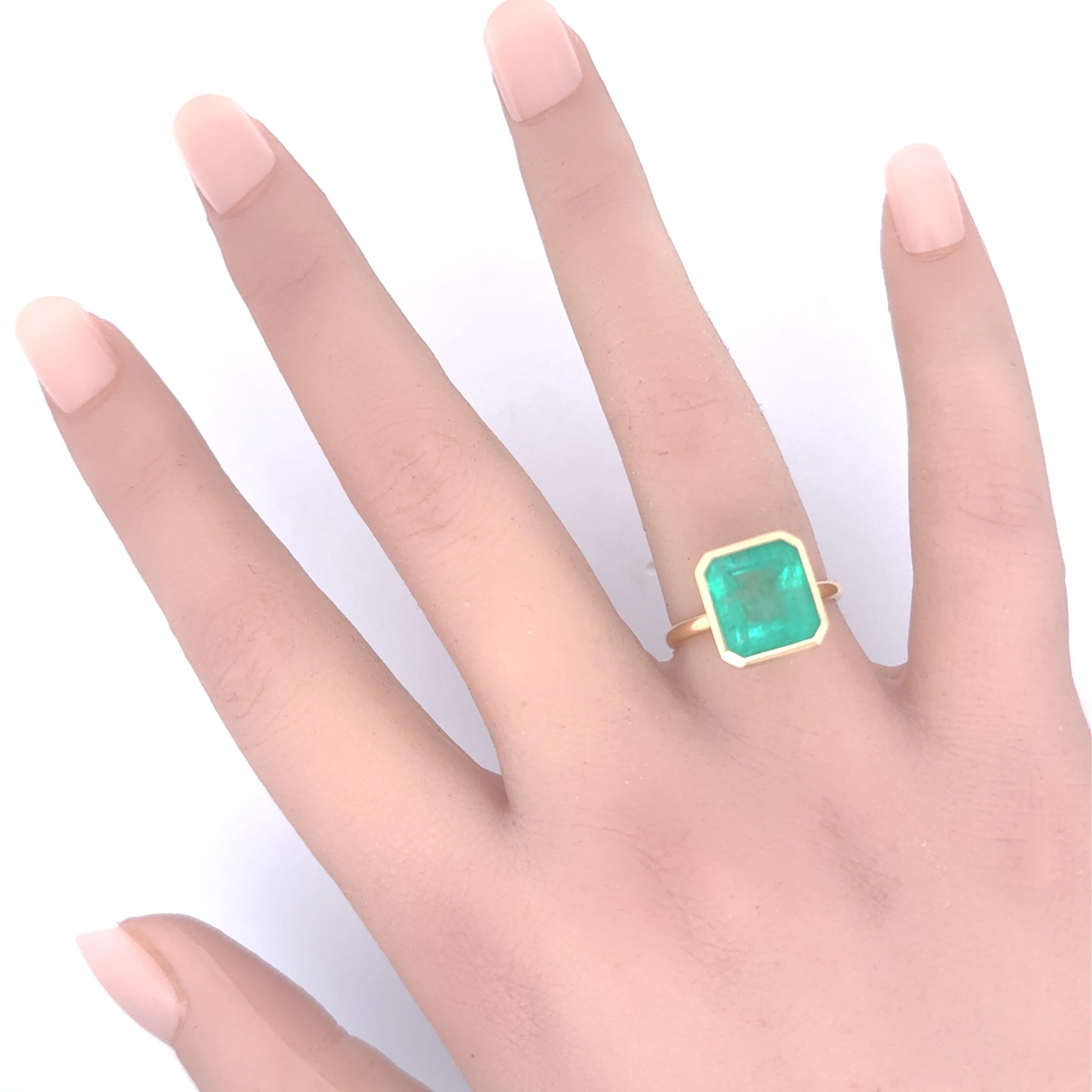 7.03 Carat Emerald 18K Yellow Gold Solitaire Bezel Ring