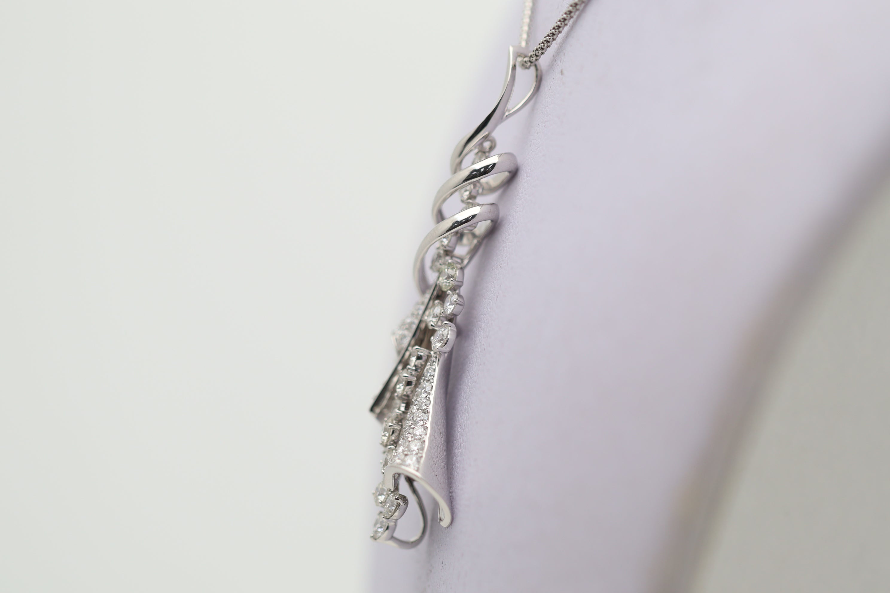 Diamond Cascade Gold Swirl Pendant