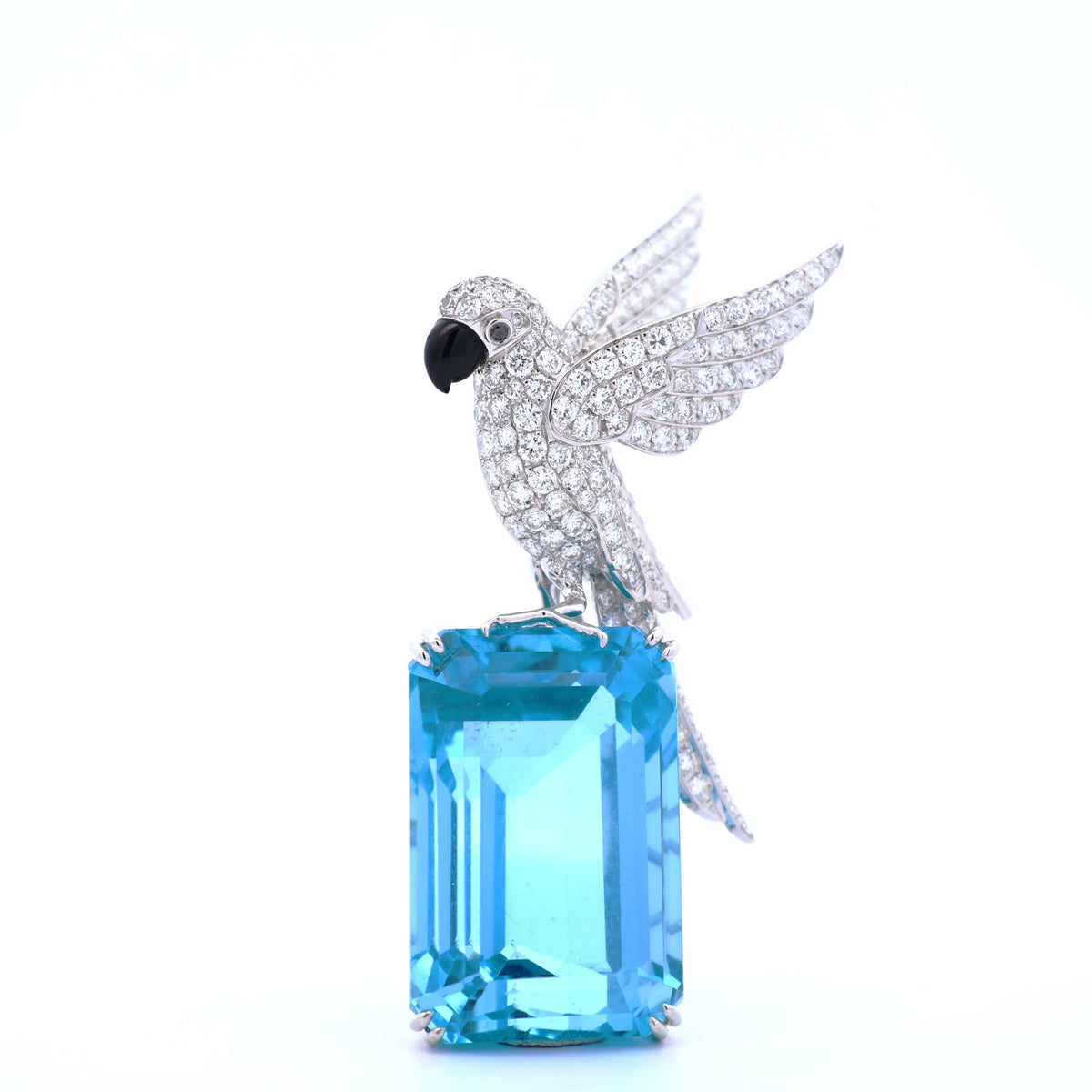 77.38 Carat Blue Topaz Diamond 18K White Gold Bird-on-Rock Brooch