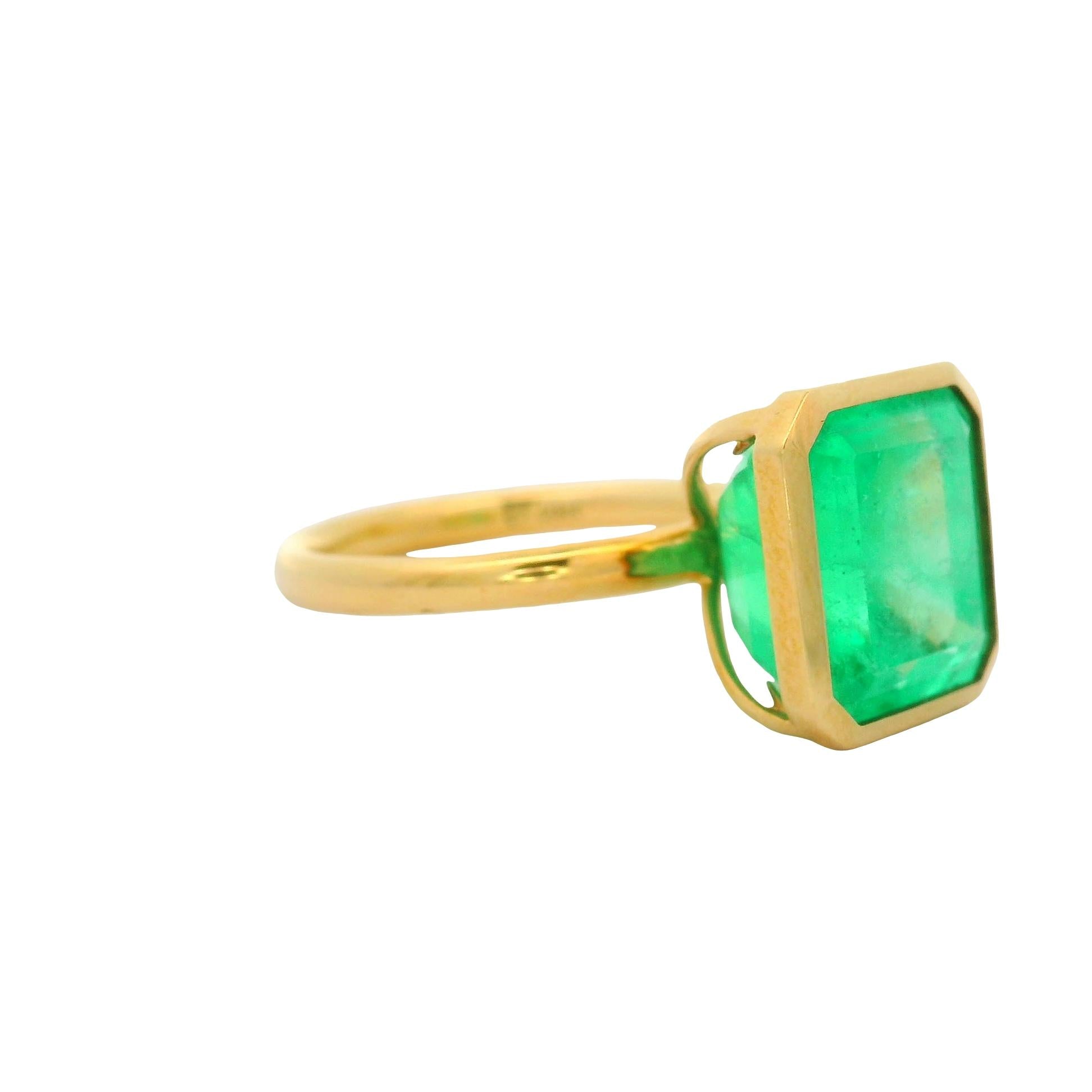 7.03 Carat Emerald 18K Yellow Gold Solitaire Bezel Ring