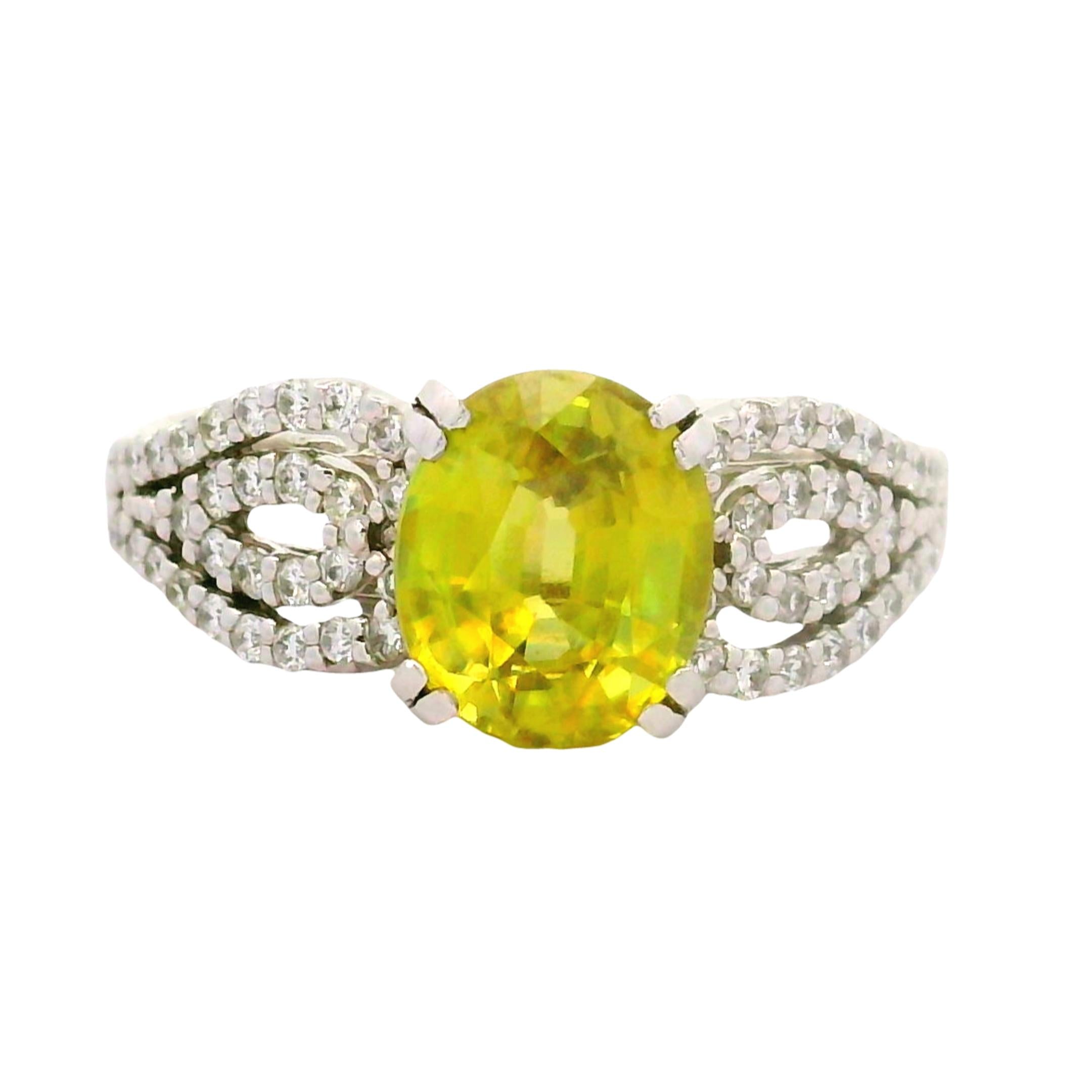 Sphene Diamond Platinum Halo Ring