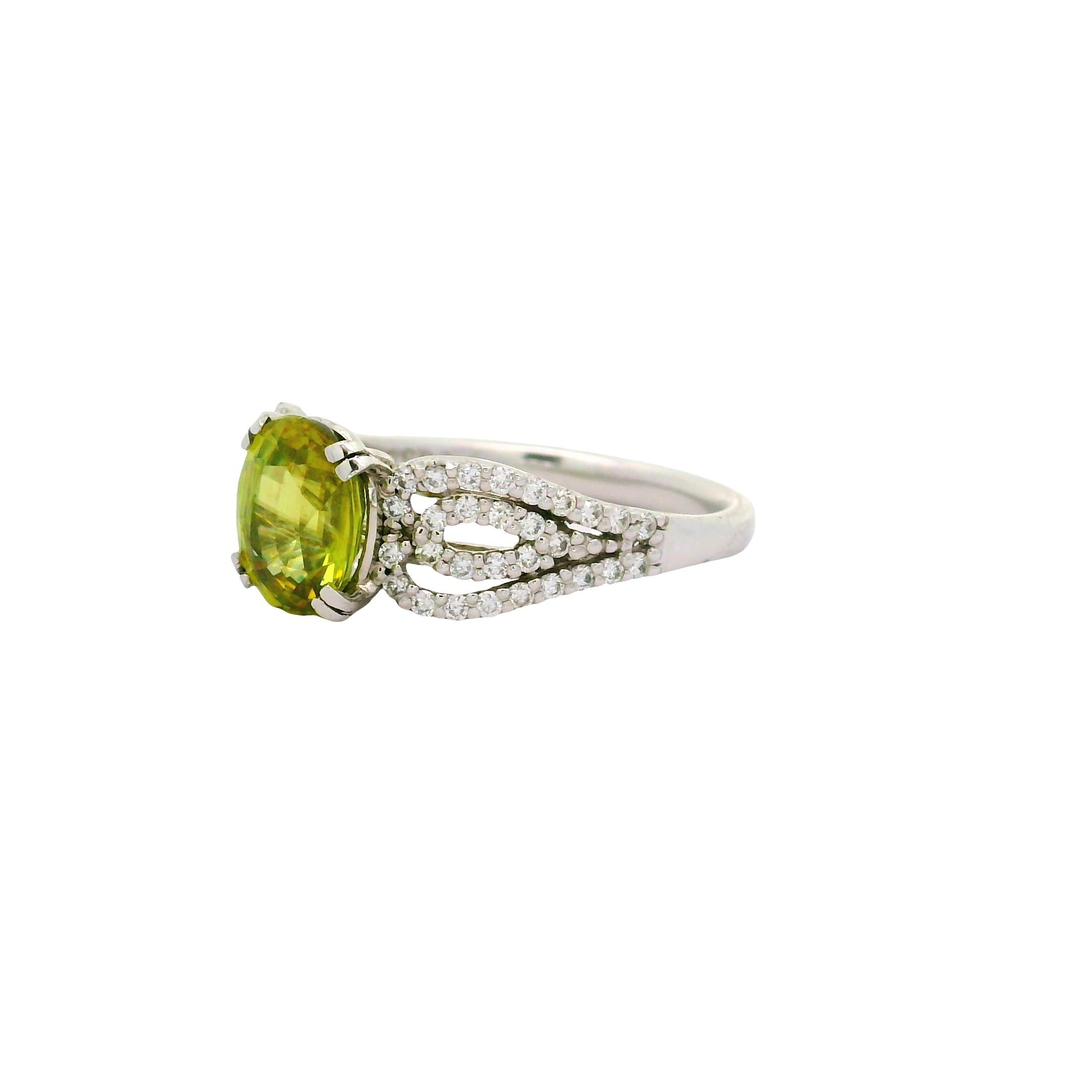 Sphene Diamond Platinum Halo Ring
