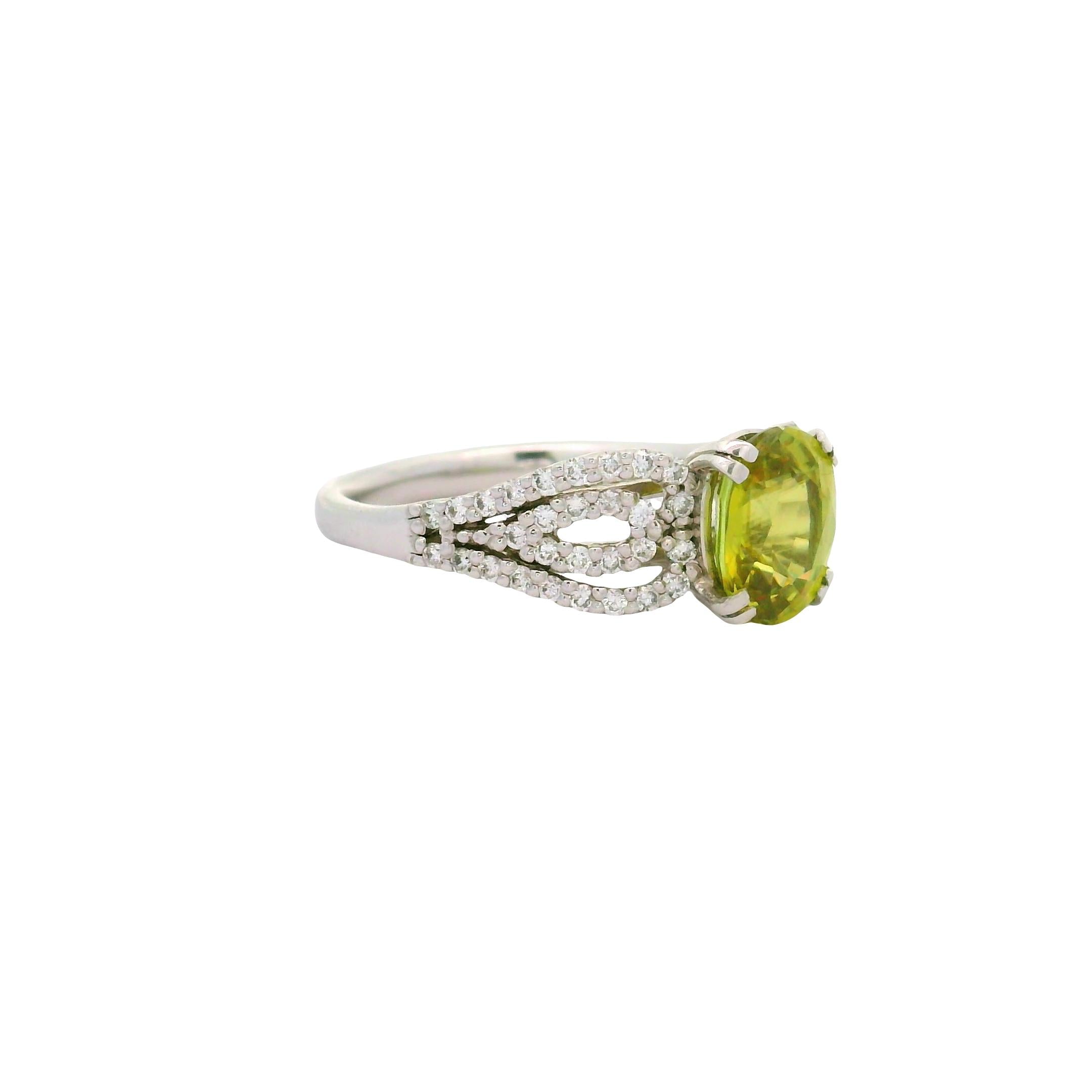 Sphene Diamond Platinum Halo Ring