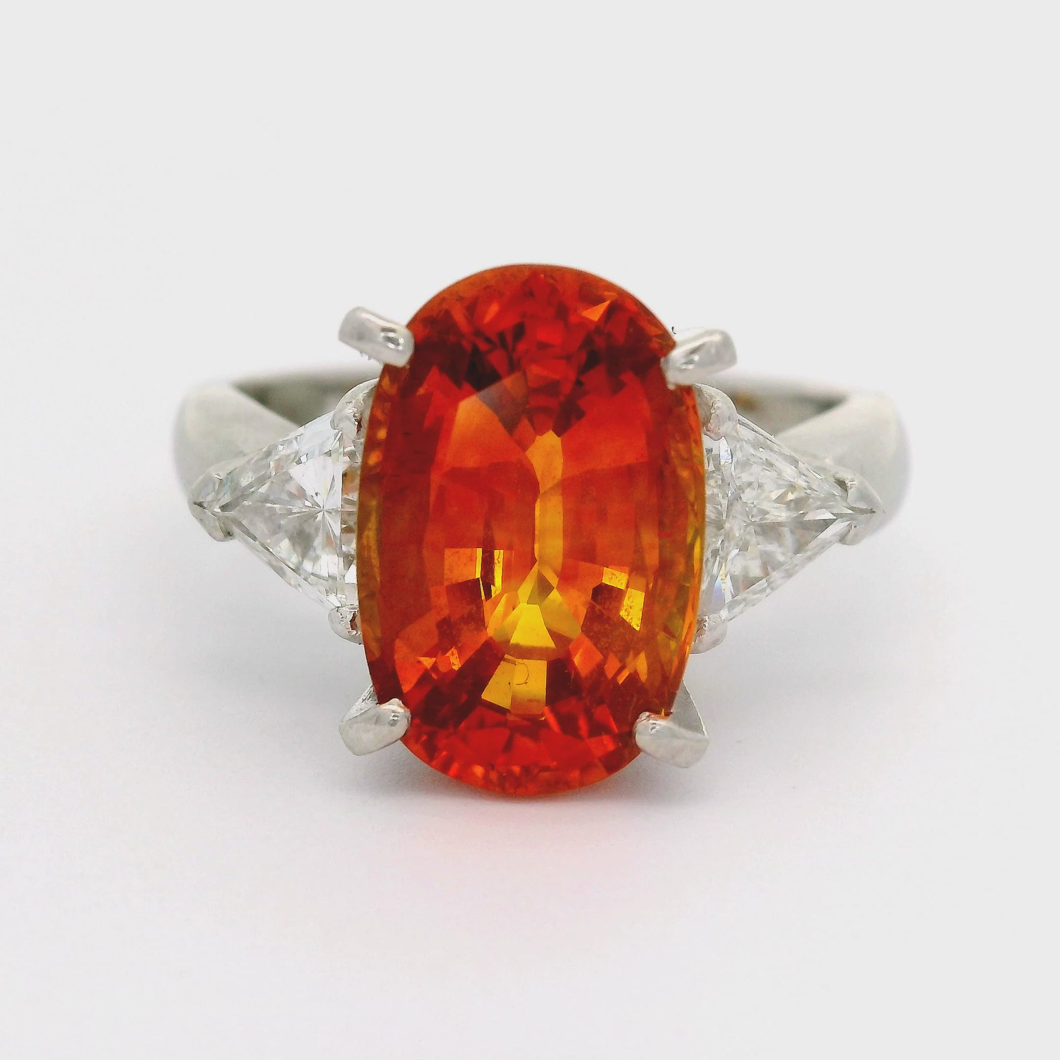 5.91 Carat Orange Sapphire Diamond Platinum Three-Stone Ring, GIA Certified
