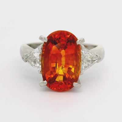 5.91 Carat Orange Sapphire Diamond Platinum Three-Stone Ring, GIA Certified