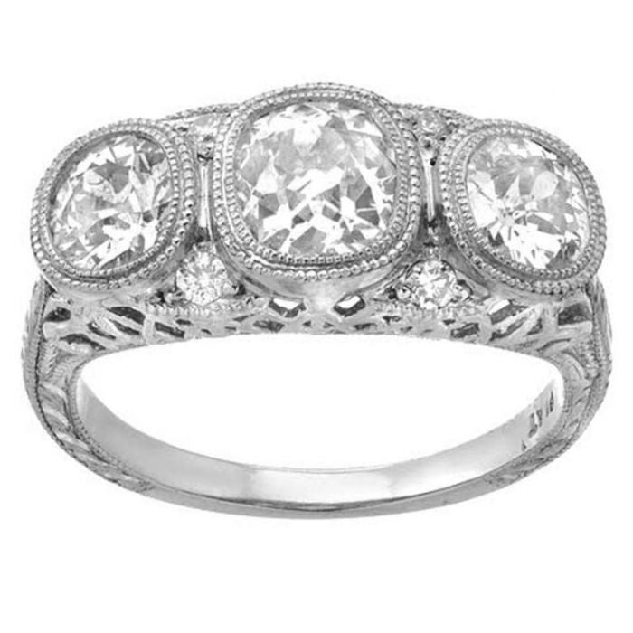 Art Deco European Cut Diamond Platinum Three-Stone Ring