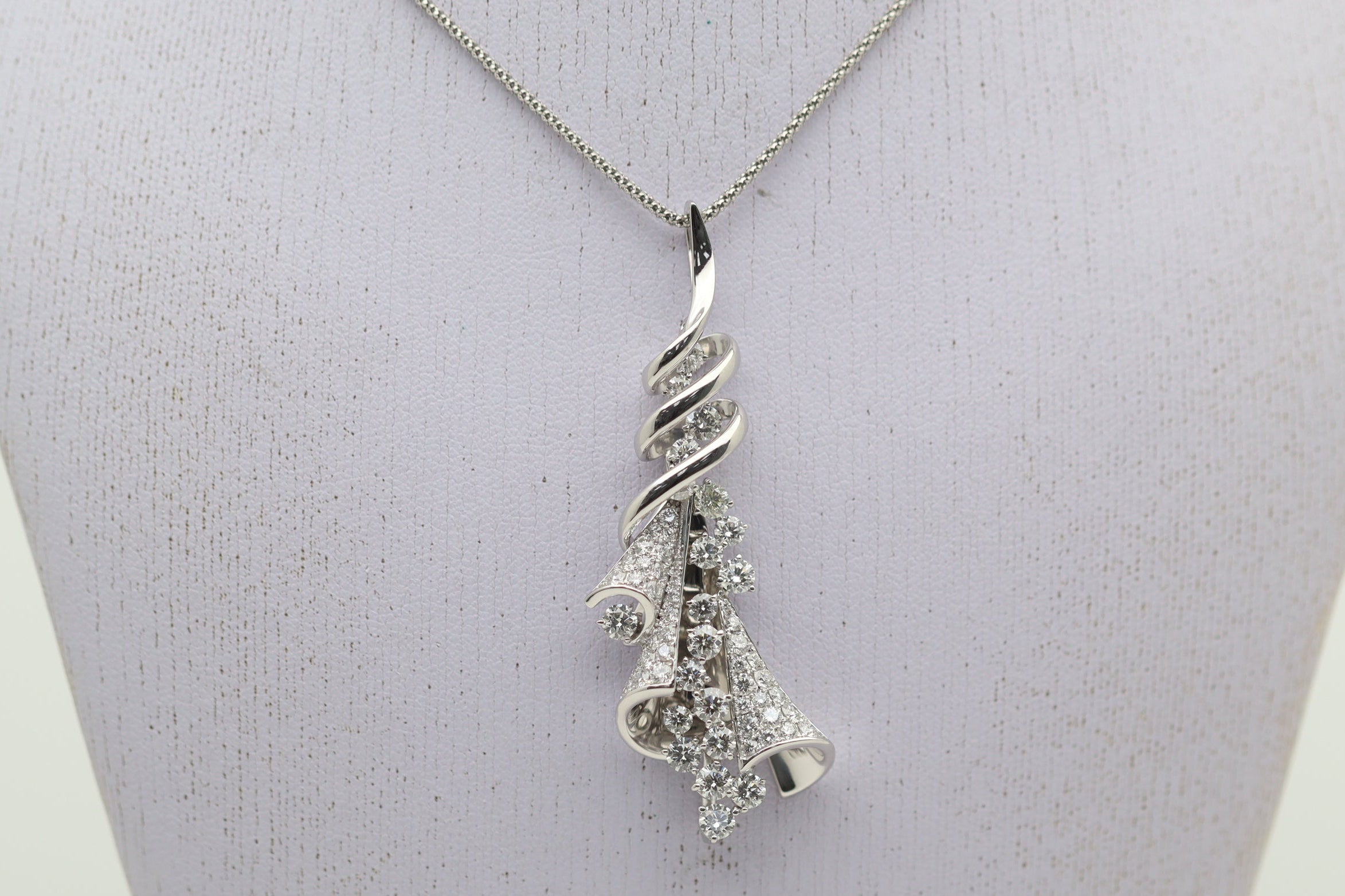Diamond Cascade Gold Swirl Pendant