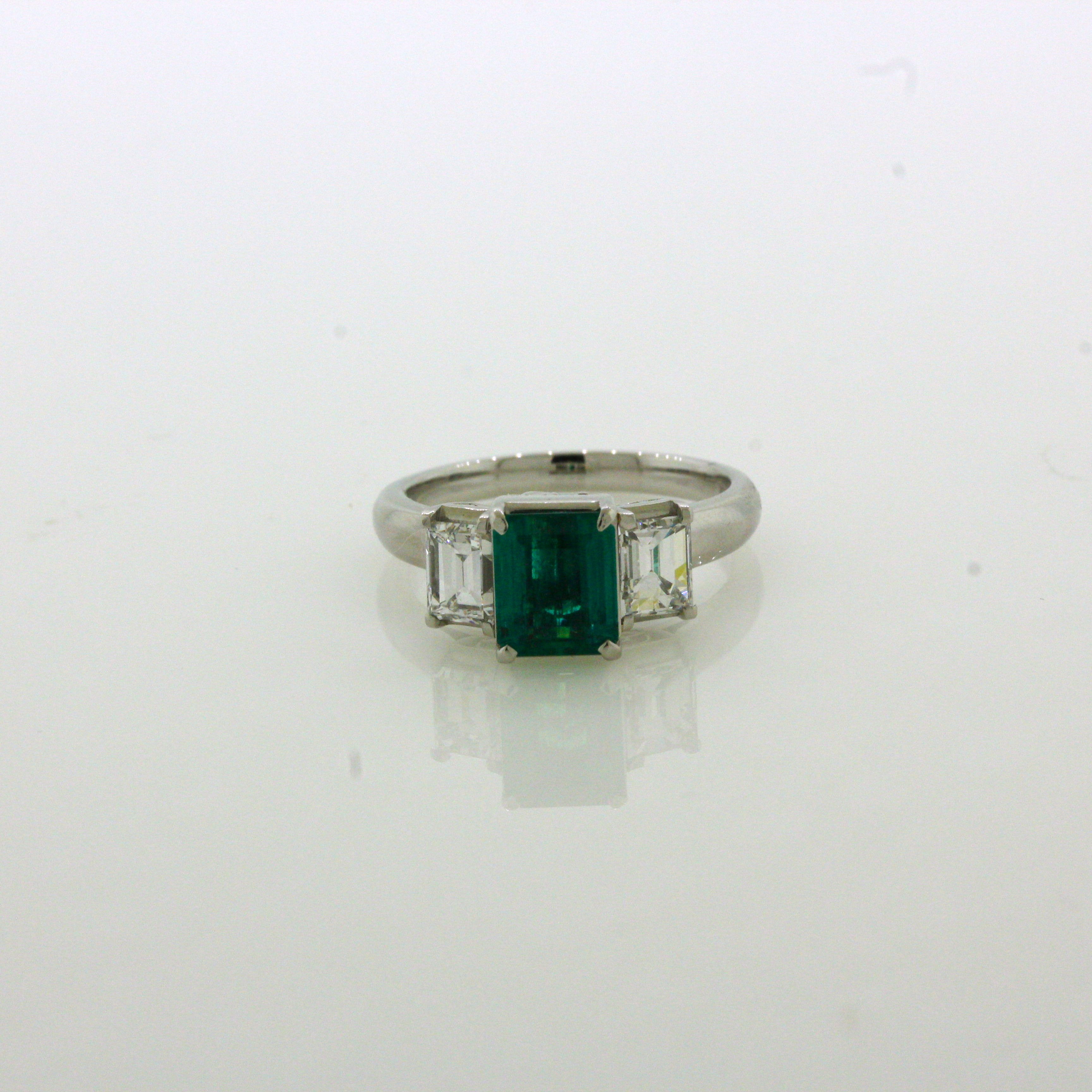 1.21 Carat Emerald Diamond 3-Stone Platinum Ring