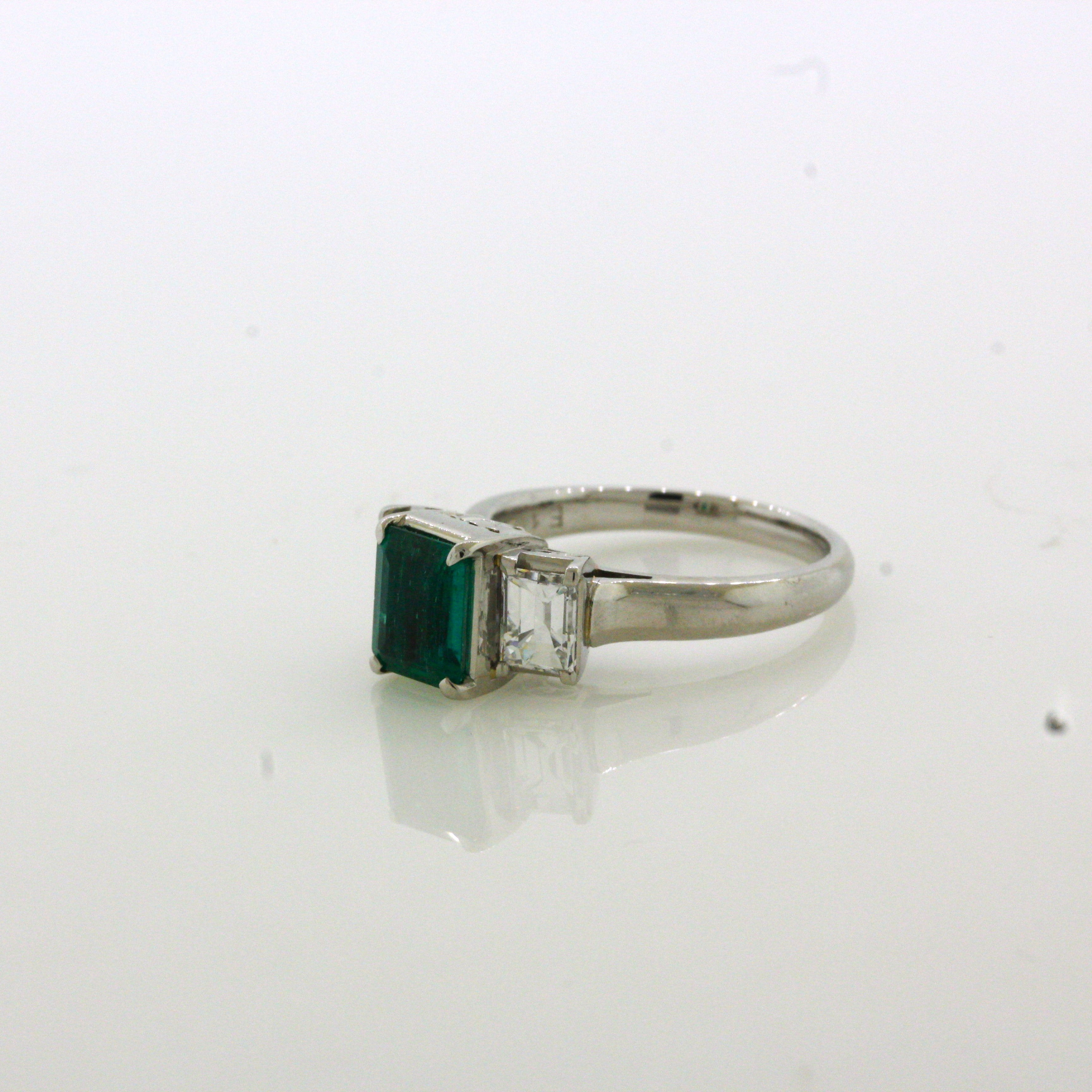 1.21 Carat Emerald Diamond 3-Stone Platinum Ring