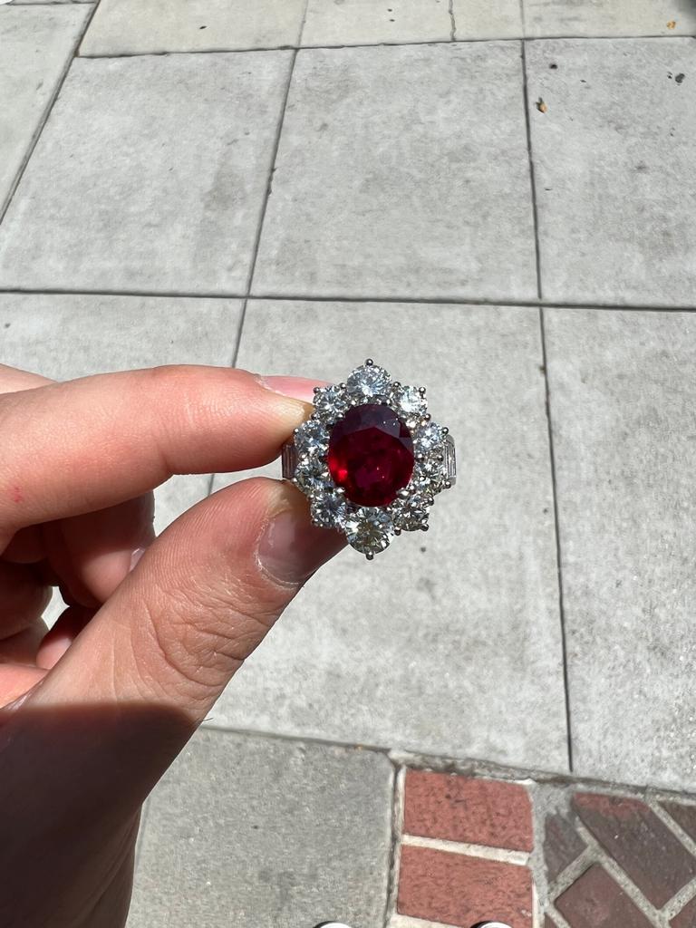 Adjustable bold red ruby ring in platinum finish lined with cz -